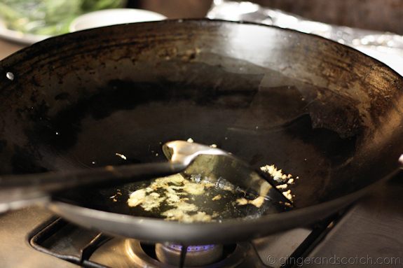 Clams in Asian Basil Sauce - The oil is flavored by the browning of the garlic and ginger