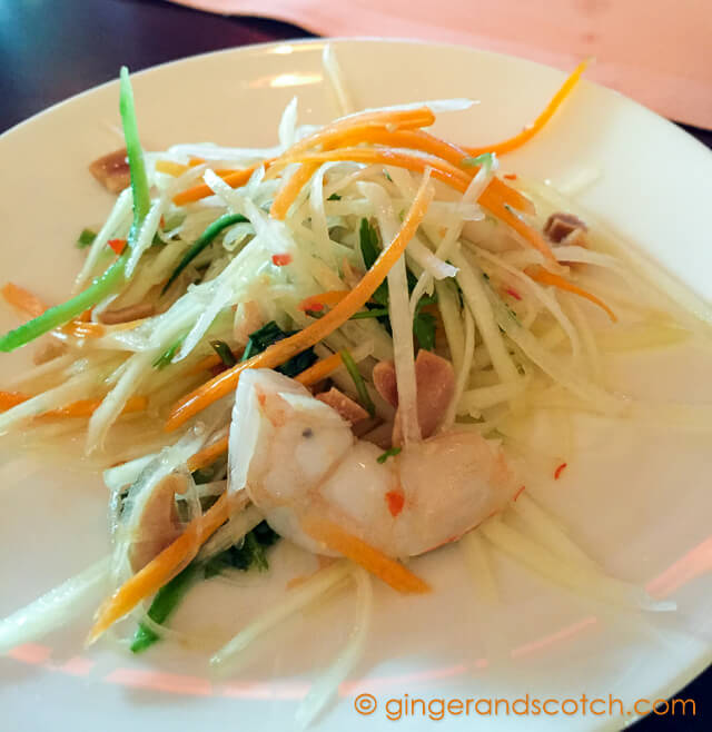 Green papaya with shrimp, cherry tomatoes and green herb lime dressing